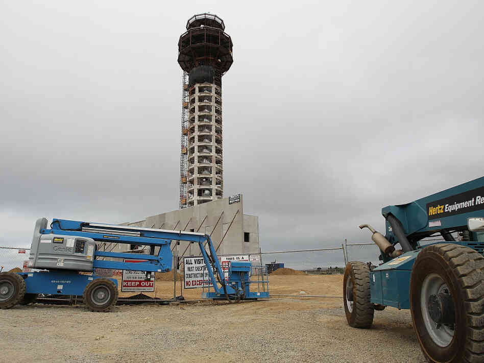 Construction equipment sits idle at the work site of a half-completed 236-foot FAA control tower at Oakland International Airport. Construction equipment sits idle at the work site of a half-completed 236-foot FAA control tower at Oakland International Airport.